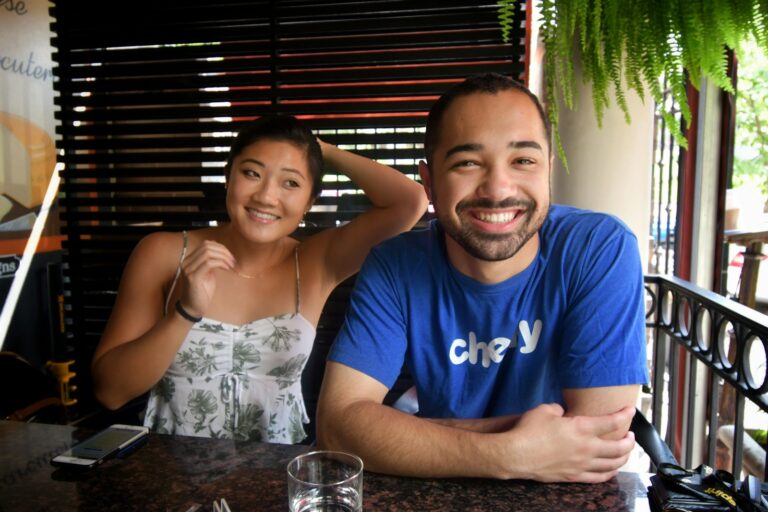 a man and a woman sitting at a table